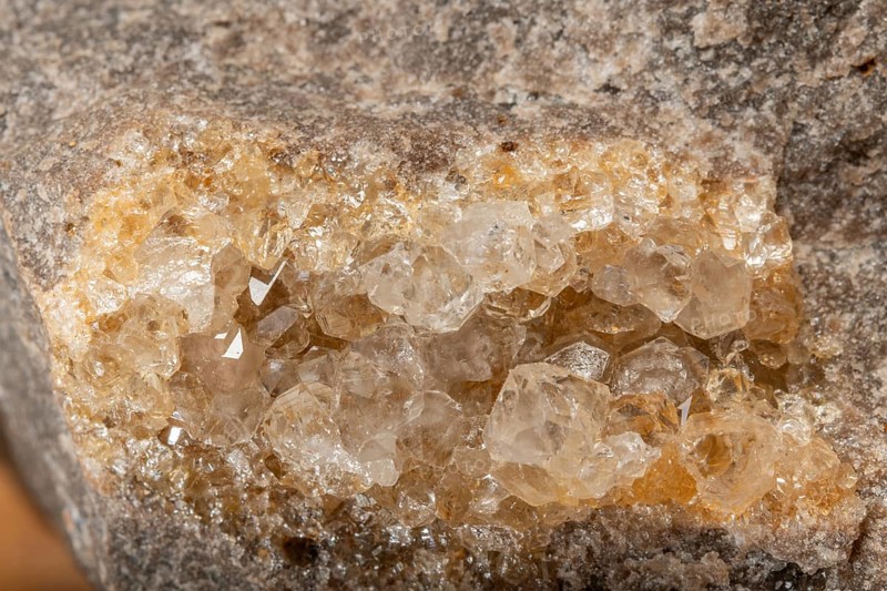 Translucent crystals shimmer in granite rocks. The discovery takes place in summer in a quiet, mountainous region. Bas Rhin, Alsace, France