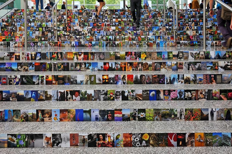 People walking on a staircase with covered photos, Photokina 2012, Messeplatz 1, Cologne, North Rhine-Westphalia, Germany