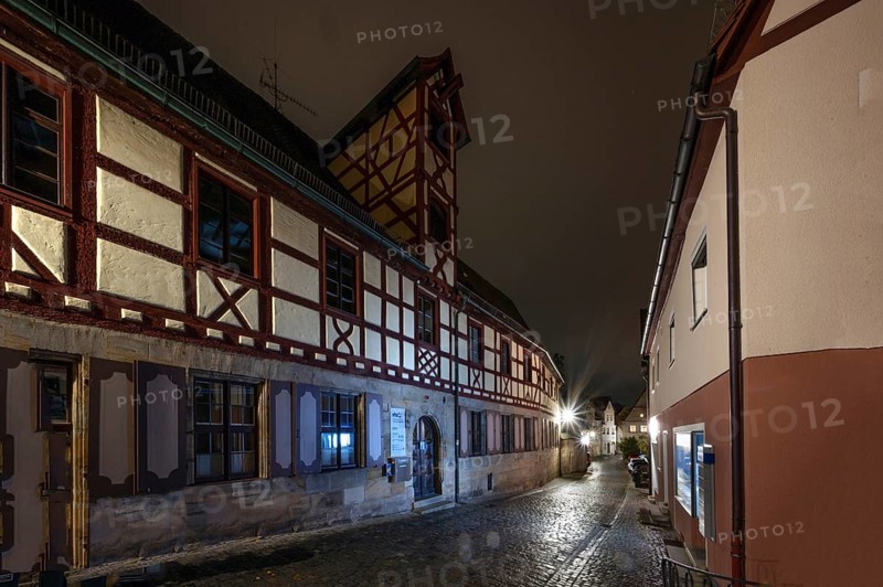 Nocturnal view of the former Glockengiesserspital, founded around 1374, Lauf an der Pegnitz, Middle Franconia, Bavaria, Germany