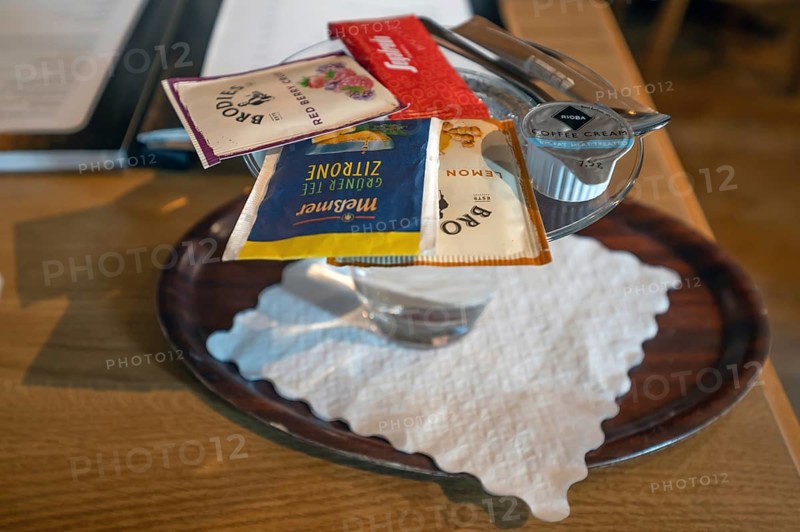 Selection of fruit teas served with a hot glass of water, Franconia, Bavaria, Germany
