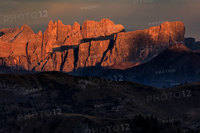 Steep mountains, mountain range, sunset, cloudy, autumn, Pordoi Pass, view of Croda da Lago, Dolomites, Italy