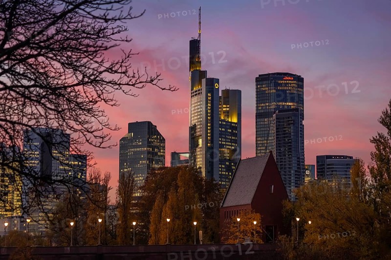 The lights of Frankfurt's banking skyline glow in the evening, Frankfurt, Hesse, Germany