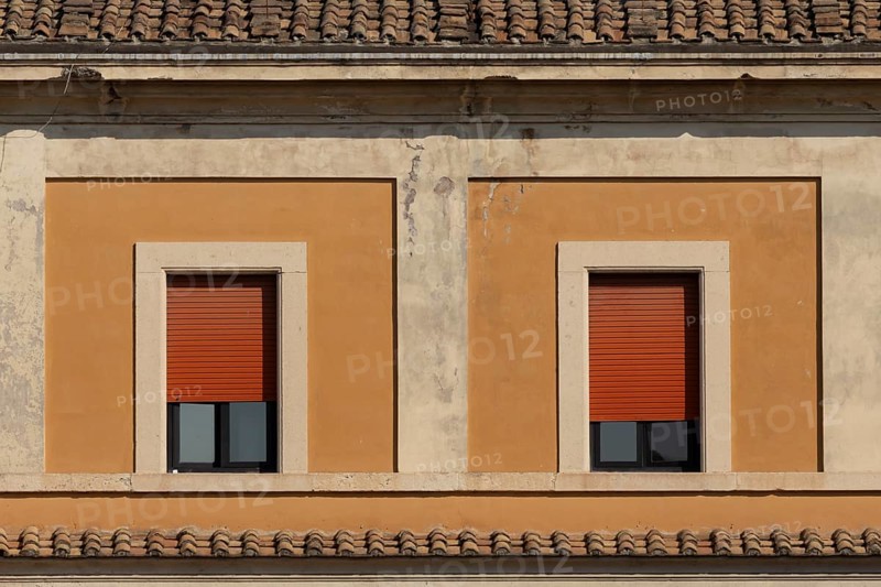 Windows of a building in the city of Rome, Italy