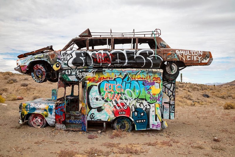 Goldfield, Nevada - The International Car Forest of the Last Church. Artist Mark Rippie has partially buried or decorated several dozen junk cars