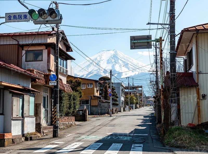 Street scene in a residential area, residential buildings and power lines, view of Mt. Fuji, Fujiyoshida, Yamanashi Prefecture, Japan