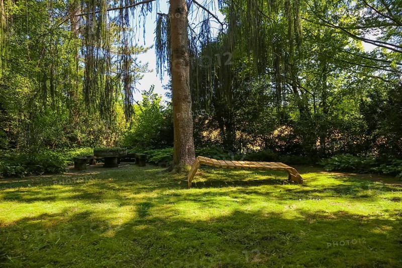 Lounger, idyllic resting place, wooden garden lounger, meadow, trees, green plants, gardens, Baden-Württemberg, Germany