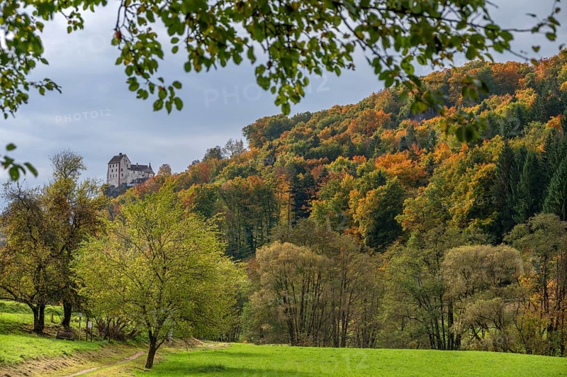 Mixed autumn forest, Egloffstein Castle on the left, Egloffstein, Franconian Switzerland, Upper Franconia, Bavaria, Germany