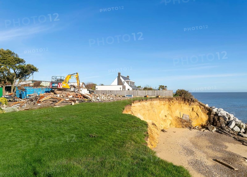 Demolition of Jean Flick's house, The Warren, Thorpeness, Suffolk, England, UK due to rapid coastal erosion of the North Sea coast, October 2025