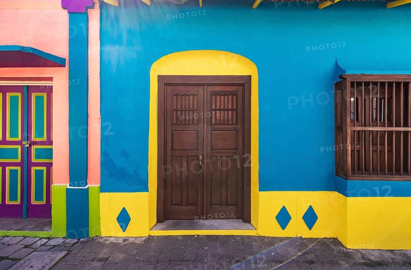 Colorful colonial architecture of historic center of Flores, Guatemala