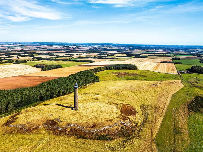 Waterloo Monument over Scottish fields and farms from a drone, Jedburgh, Scotland, UK