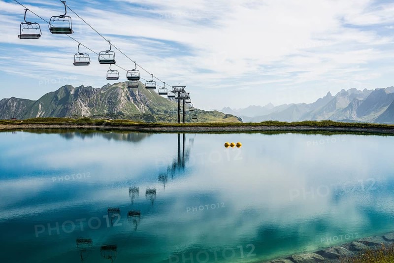 Mountain landscape with reservoir and chairlift, Saloberkopf, Warth, Bregenzerwald, Vorarlberg, Alps, Austria