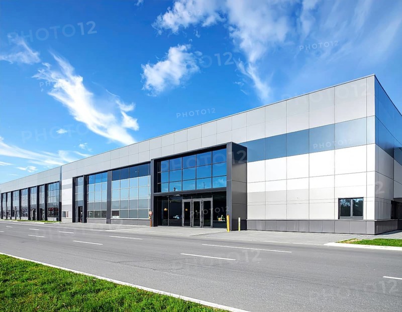 Modern supermarket building exterior against blue sky, Inviting white facade, some clouds, concept of shopping and consume, AI generated