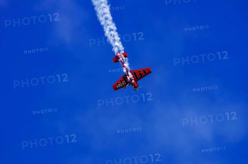A Soviet Jakovlev Jak-55 sport aircraft with the registration LY-TOY during a flight demonstration as part of an air show on Rossfeld in Metzingen-Glems, Baden-Württemberg, Germany, for editorial use only
