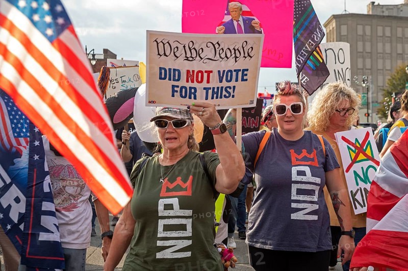 Detroit, Michigan USA - 18 October 2025 - A large crowd gathered for a 'No Kings' rally, protesting President Trump's actions against immigrants and against democratic institutions