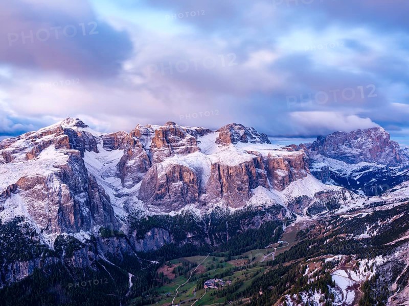 Sella group with fresh snow above the green Val Badia valley, Langkofel on the right, Dolomites, Trentino, South Tyrol, Italy