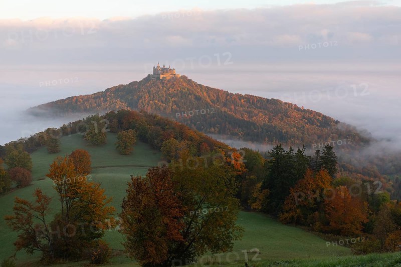 Hohenzollern Castle in a sea of fog at sunrise, autumn in the Swabian Jura