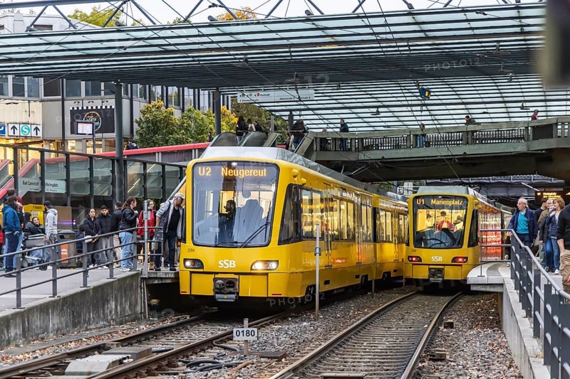 Wilhelmsplatz Bad Cannstatt stop, Stuttgarter Strassenbahnen AG, SSB. Platform with passengers. Stuttgart, Baden-Württemberg, Germany