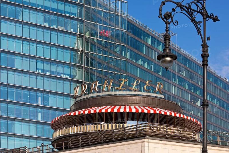 Café Kranzler with historic lantern and modern office building on Kurfürstendamm, Charlottenburg, Berlin, Germany