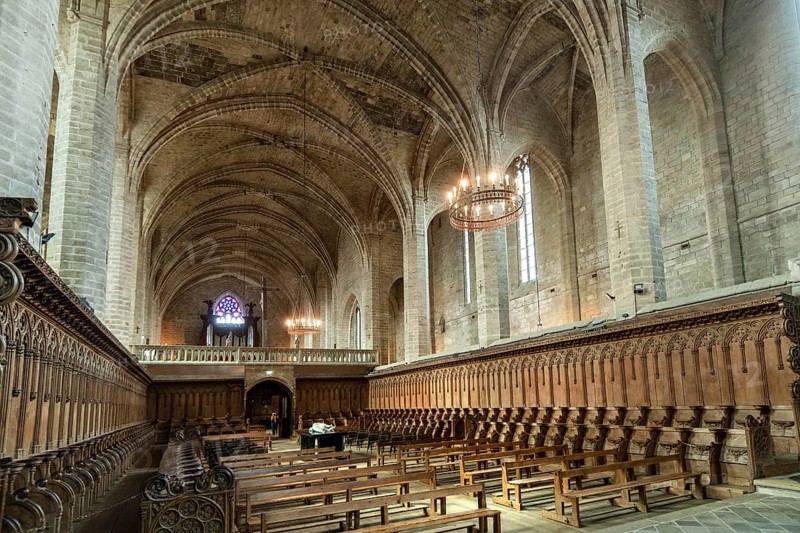 Choir stalls and Pope Clement VI tomb Saint Robert Abbey, La Chaise Dieu, Haute Loire, Auvergne Rhone Alpes, France