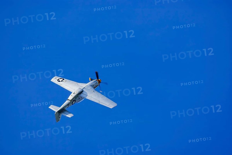 A North American P-51 Mustang of the flying group Flying Bulls, the Nooky Booky IV during an air show at the Rossfeld in Metzingen-Glems, Baden-Württemberg, Germany, for editorial use only