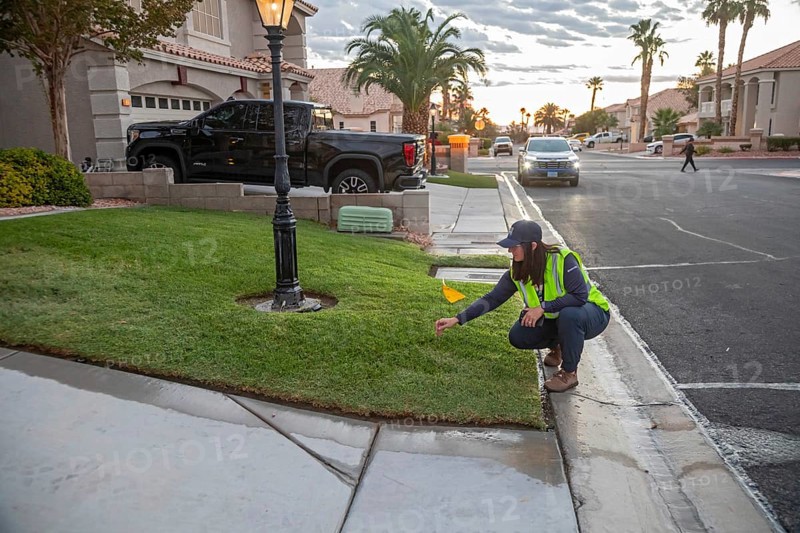 Las Vegas, Nevada - Devyn Choltko, a water waste investigator, patrols a residential neighborhood issuing tickets for illegal water use. The Las Vegas Valley Water District has cut usage of scarce Colorado River water by more than 30% over the last 20 years despite a growing population
