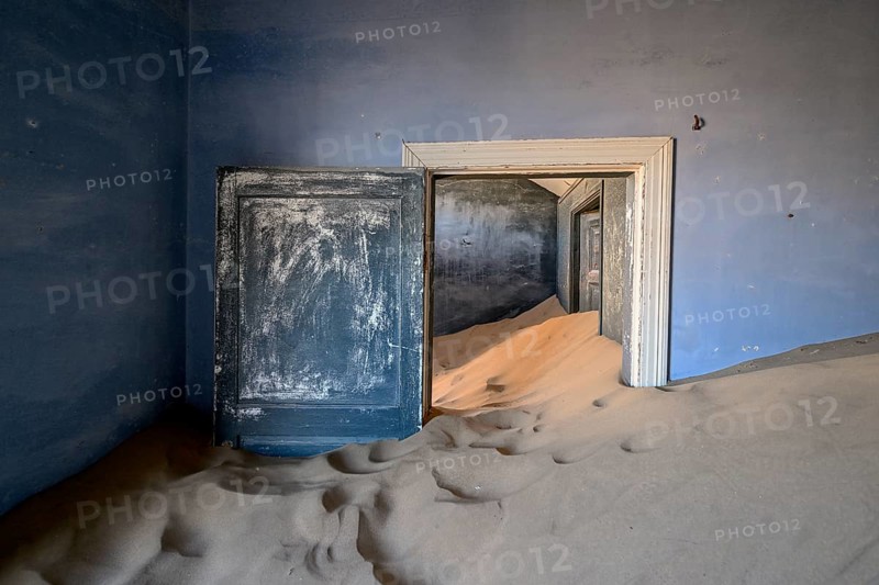 Former dwelling house full of sand, Kolmanskop, restricted diamond area, Karas region, Namibia