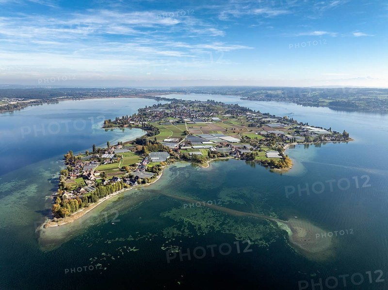 Aerial view of the north-western tip of the island of Reichenau in Lake Constance, with the district of Niederzell and the columned basilica of St Peter and Paul, Windegg Castle on the shore, district of Constance, Baden-Württemberg, Germany