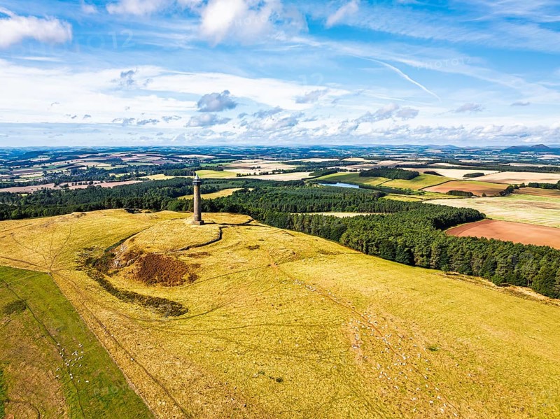 Waterloo Monument over Scottish fields and farms from a drone, Jedburgh, Scotland, UK
