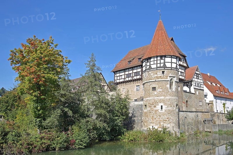 Zollern Castle built around 1255 with water tower on the Eybach stream, half-timbered house, autumn, castle, Balingen, Swabian Alb, Baden-Württemberg, Germany