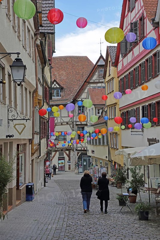 Houses in the Marktgasse with colourful lanterns, decoration, balloons, pedestrians, city museum, shopping, stroll, idyll, Tübingen, Neckartal, Baden-Württemberg, Germany