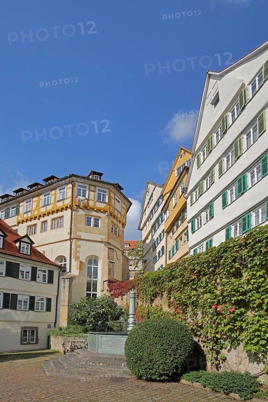View from the inner courtyard of the Protestant monastery with fountain to houses with shutters in the Klosterberg, idyll, Tübingen, Neckartal, Baden-Württemberg, Germany