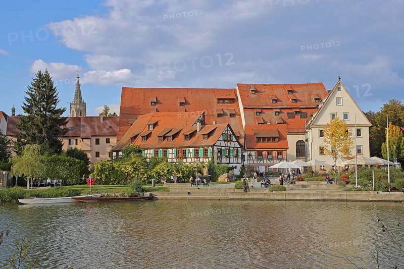 Half-timbered houses, town mill, tithe barn on the banks of the Neckar, pedestrians, boats, riverside promenade, footbridge, underwater, Rottenburg am Neckar, Neckar valley, Baden-Württemberg, Germany