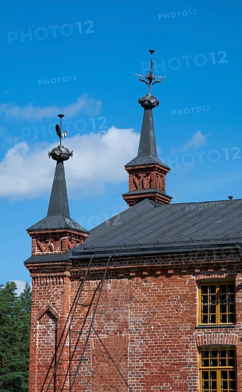 Gable with weather vane and ornamental iron elements, former paper factory and mill for the production of groundwood pulp board, UNESCO World Heritage Site Verla Factory Village, Maailmanperintökohde Verlan puuhiomo ja pahvitehdas, Verla Rapids, Kymenlaakso, near Kouvola, Finland