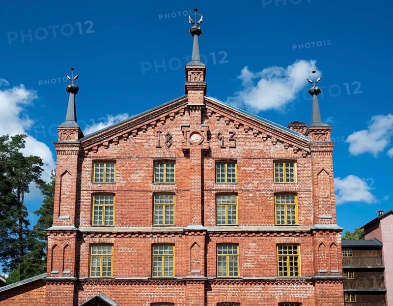 Multi-storey brick façade with inscription 1893, former paper factory and mill for the production of groundwood pulp board, UNESCO World Heritage Site Factory Village Verla, Maailmanperintökohde Verlan puuhiomo ja pahvitehdas, Verla Rapids, Kymenlaakso, near Kouvola, Finland