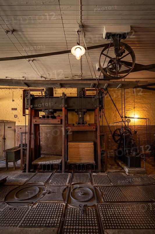 Factory hall with historical machines for the production of cardboard and paper, former paper factory and mill for the production of groundwood pulp board, UNESCO World Heritage Site Verla Factory Village, Maailmanperintökohde Verlan puuhiomo ja pahvitehdas, Verla Rapids, Kymenlaakso, near Kouvola, Finland