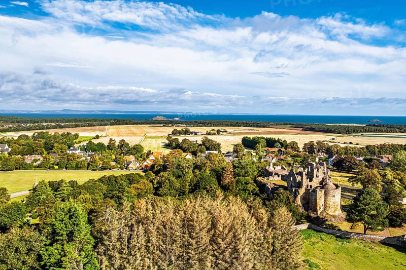 Ruins of Dirleton Castle & Gardens from a drone, Dirleton, East Lothian, Scotland, UK