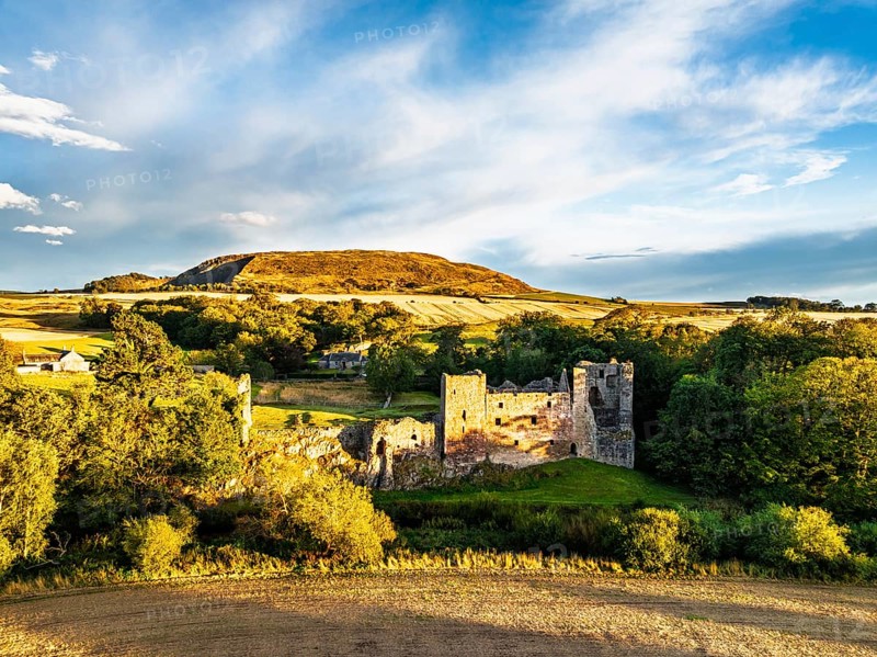 Ruins of Hailes Castle over River Tyne from a drone, East Linton, East Lothian, Scotland, UK