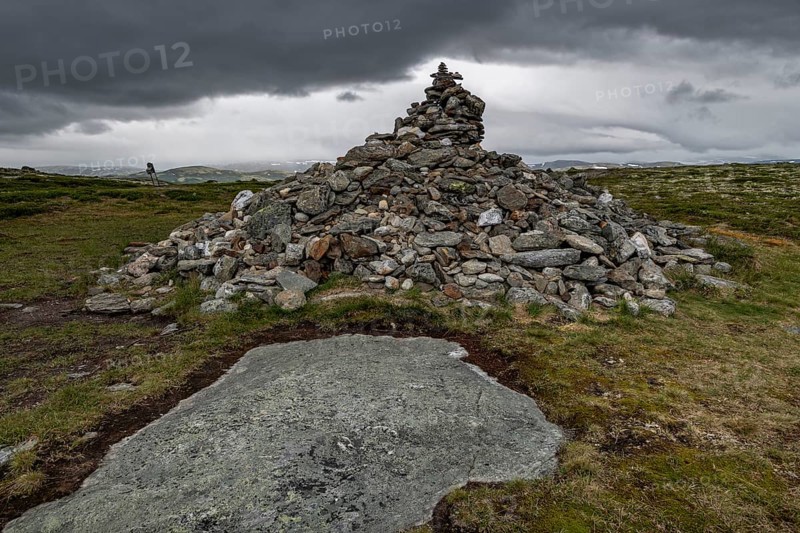 Stones deposited by pilgrims, stone pyramid, Allmannrøysa, Olav's Way or Olavsleden, old Kongevegen or King's Path over Dovrefjell, Norway
