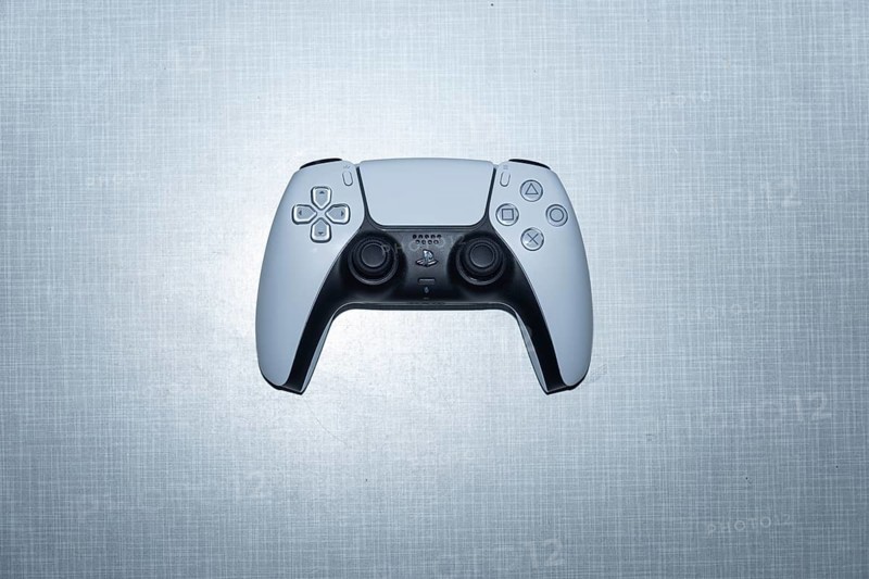 Top Shot white Sony PS5 Playstation Controller on a Resopal plate