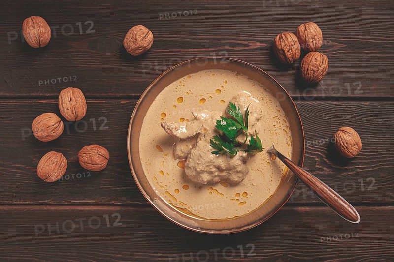 Satsivi, Georgian dish, chicken in nut sauce, cold appetizer, rustic, no people, homemade