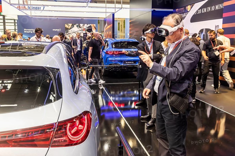 Mercedes trade fair stand with virtual presentation. Trade fair visitors with 3D glasses. The Virtual Ride. CLA Shooting Brake. IAA MOBILITY in Munich. The motor show presents itself as a holistic mobility trade fair. But cars are still the centre of attention. Munich, Bavaria, Germany
