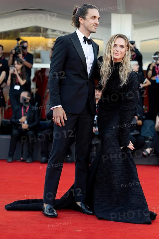 Venice, Italy - 2 September 2025: Rory St. Clair Gainer, Rebecca Ferguson during the Red Carpet of - A house of Dynamite - during the 82nd Venice International Film Festival