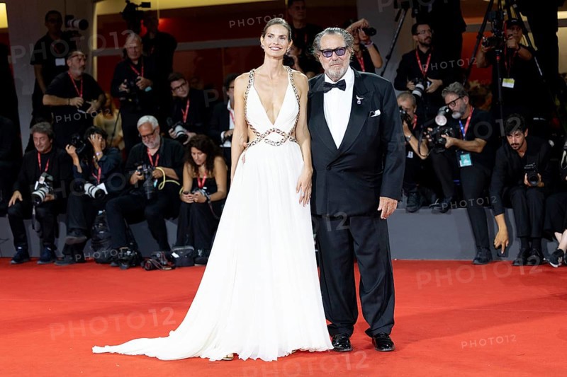 Venice, Italy - 3 September 2025: Louise Kugelberg and Julian Schnabel during the Red Carpet of - Cartier Glory To The Filmmaker Award 2025 and In the Hand of Dante - during the 82nd Venice International Film Festival