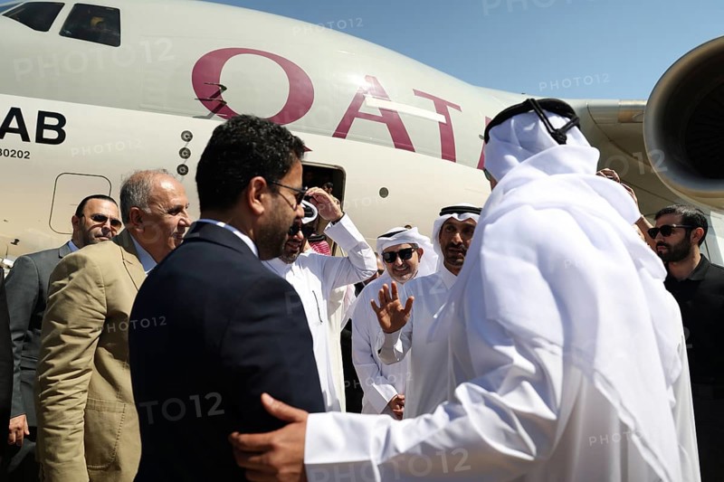 Syrian Health Minister Musab al-Omar welcomes a Qatari aircraft loaded with medical and humanitarian supplies at Damascus International Airport, part of Qatar's major aid to support Syria's recovery after the, Damascus, Damascus, Syria