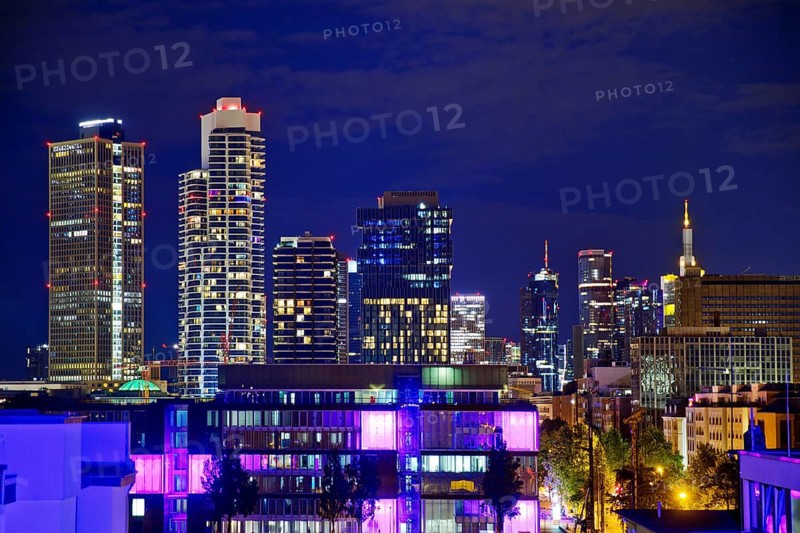 Rooftop day with colourfully illuminated houses for a techno party on the roof with a view of the skyline, Frankfurt am Main, Hesse, Germany