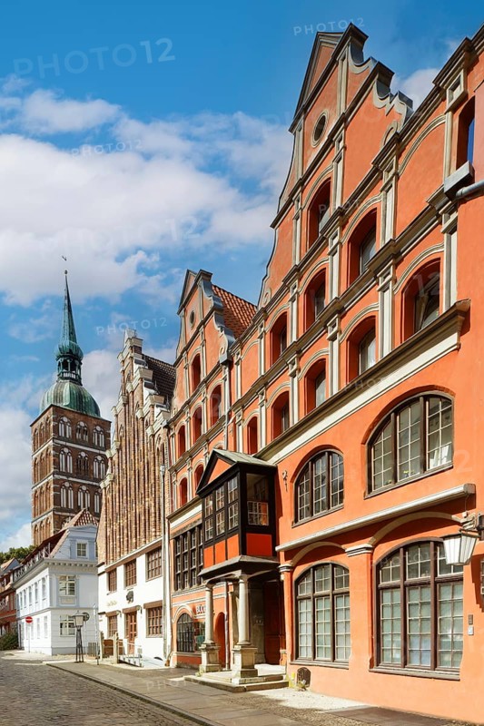 Magnificent row of houses with gables, St Nikolai Church tower at the back left, Old Town, Badenstraße, Unesco World Heritage Site, Stralsund, Mecklenburg-Western Pomerania, Germany