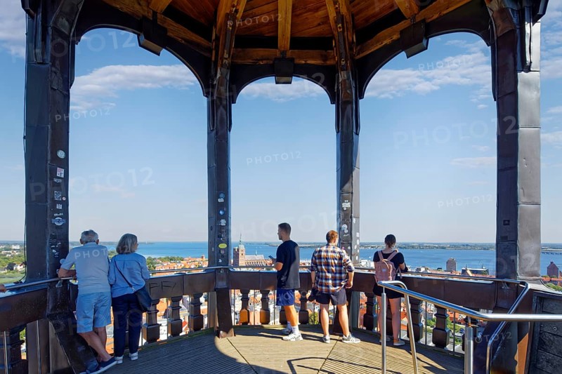 Visitors look out over the city, viewing platform view at a height of 84 metres, St. Mary's Church, also known as Marienkirche, basilica, late Gothic, three naves with transept, first mentioned in 1298, Neuer Markt, Old Town, UNESCO World Heritage Site, Hanseatic City of Stralsund, Mecklenburg-Western Pomerania, Germany
