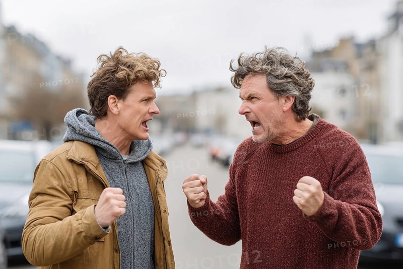 Two angry men arguing in the street, possibly triggered by a road traffic incident, symbolic image for aggressive behaviour in road traffic, AI generated
