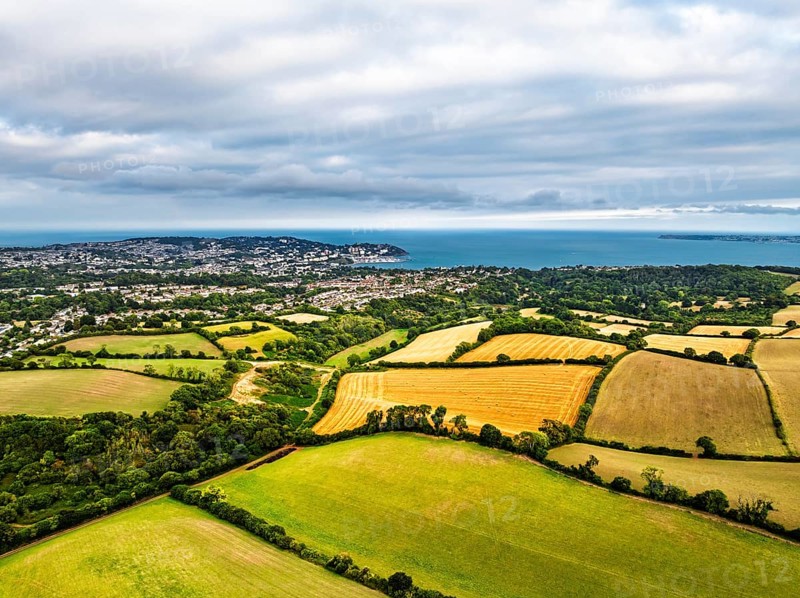 Colors of Fields and Farms over Torquay from drone, Torbay, Devon, England, United Kingdom