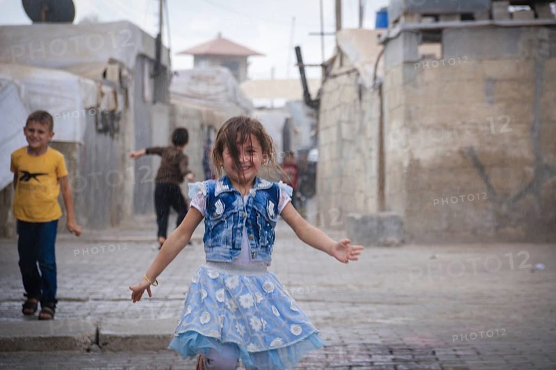 Syrian children playing in a refugee camp near the Turkish border on World Children's Day. Aleppo, Syria March 2, 2017, Aleppo, Syria